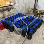 Київ: знайдено нелегальний цех з підробками алкоголю та 148 тисячами пачок.